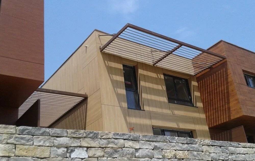 Réalisation pergolas maison moderne
